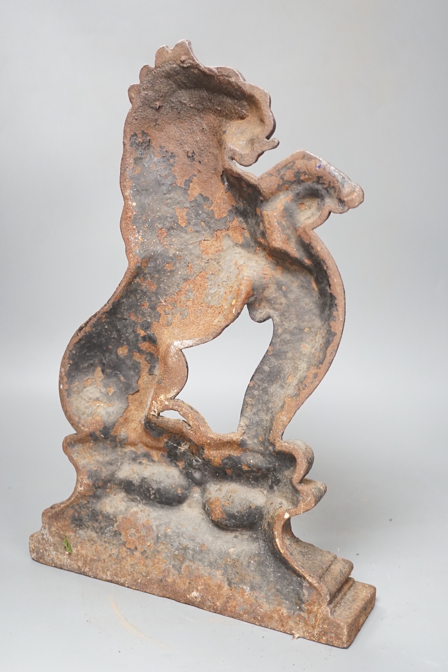 A Victorian cast iron rearing lion door stop, 38.5cm